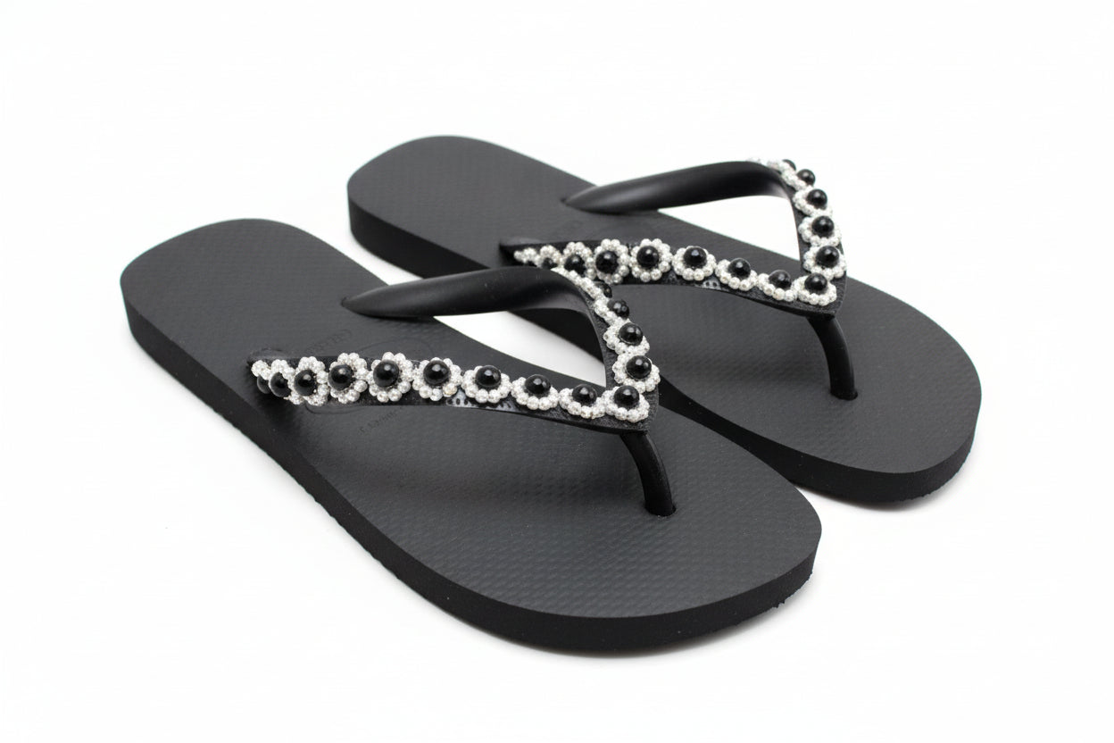 Matte black sandal with refined strap detailing